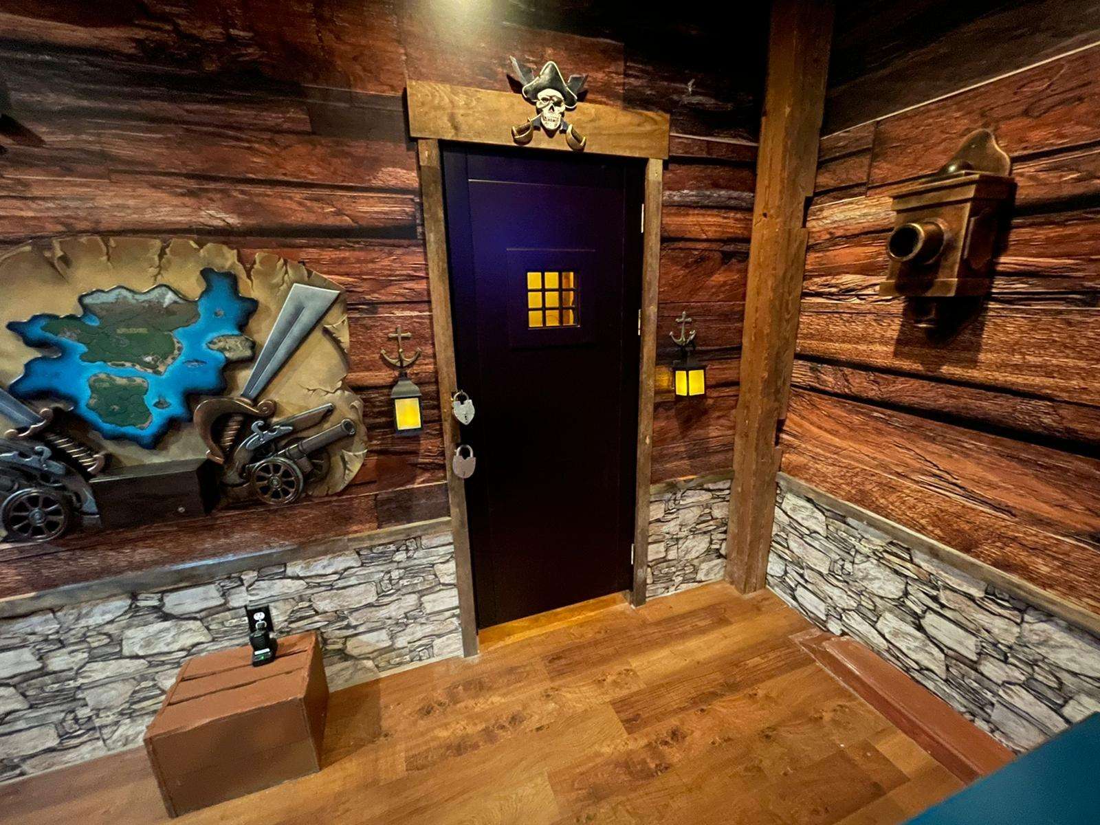 Legend of the Shoals pirate escape room by Indestroom at Monkey Mind, Portsmouth: the cabin door and the treasure wall