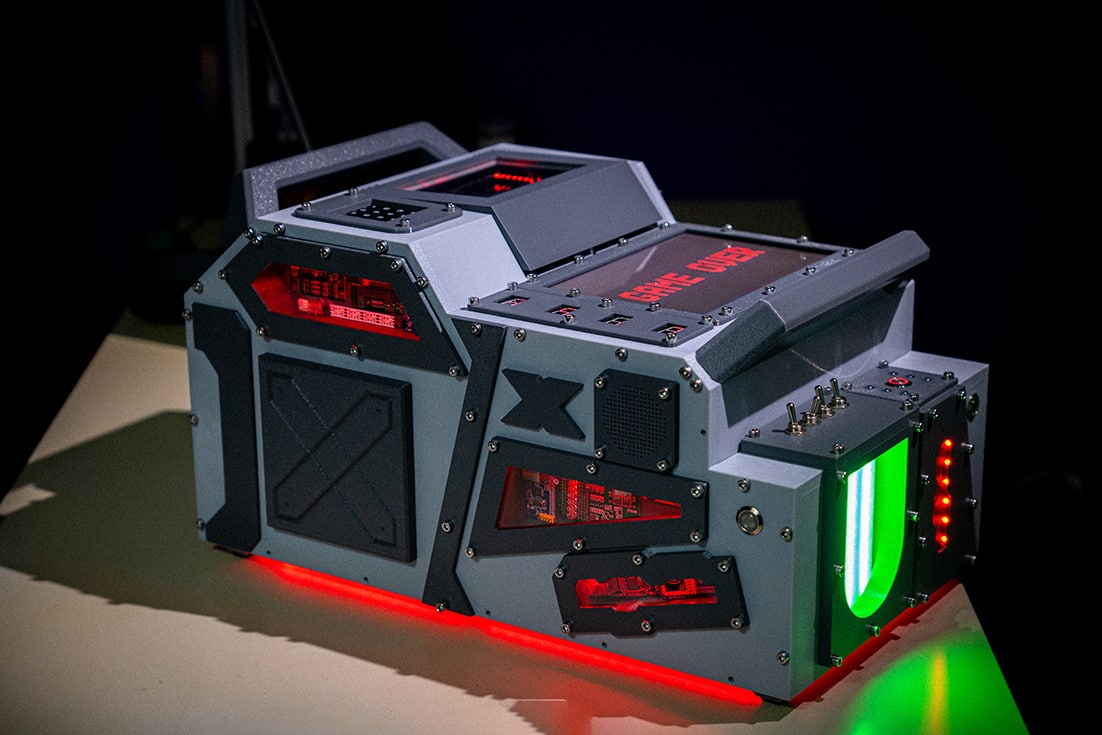 Bomb 2.0 portable escape game case with green and red lights